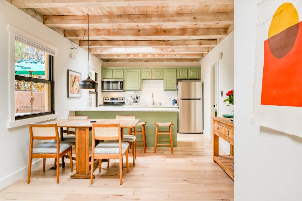 Fully renovated duplex in ideal location with private courtyard & kiva fireplace