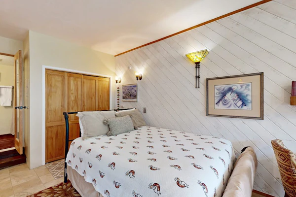 Amazing condo with river & mountain views, hot tub, & wood-burning fireplace