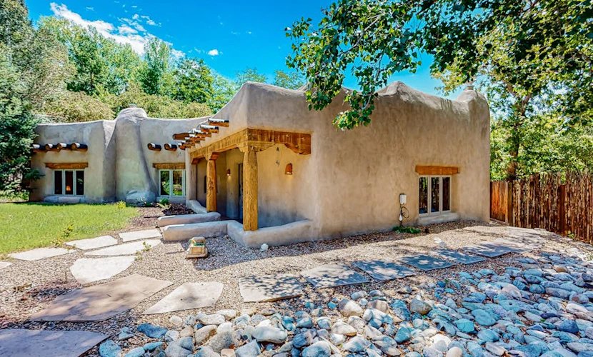Beautiful adobe home steps the plaza with private patio and garden