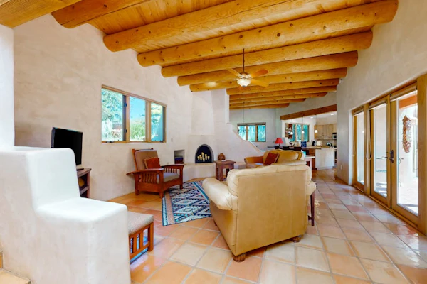 Beautiful adobe home steps the plaza with private patio and garden