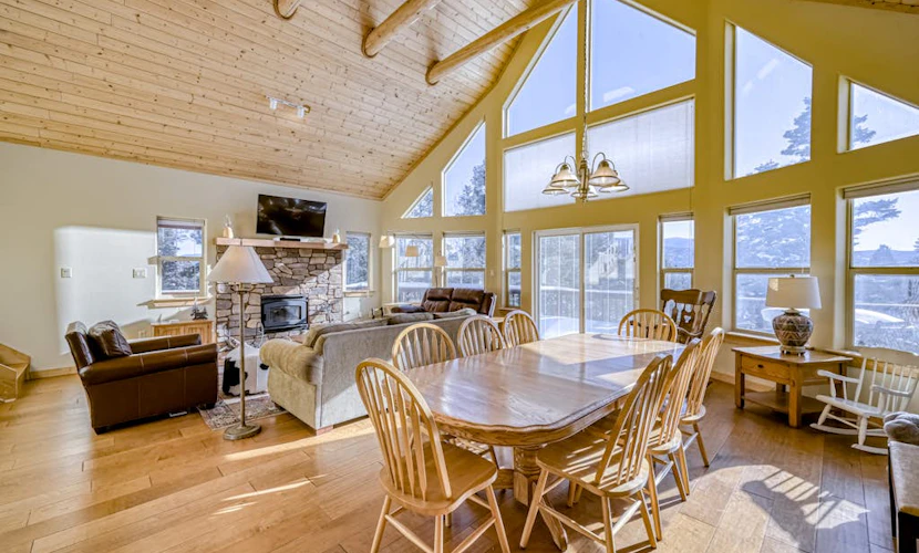 Peaceful mountain-view home with fireplace & wraparound deck - child-friendly