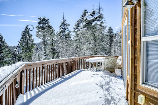 Peaceful mountain-view home with fireplace & wraparound deck - child-friendly