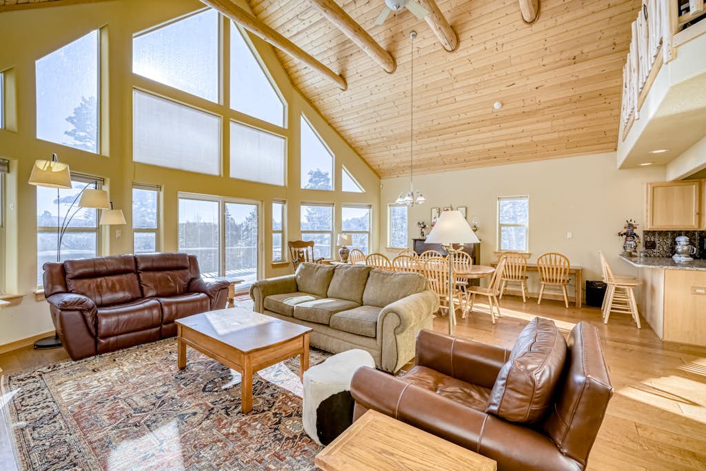 Peaceful mountain-view home with fireplace & wraparound deck - child-friendly