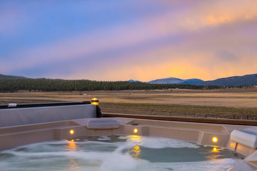 Scenic villa with mountain views, private hot tub, grill, and washer/dryer