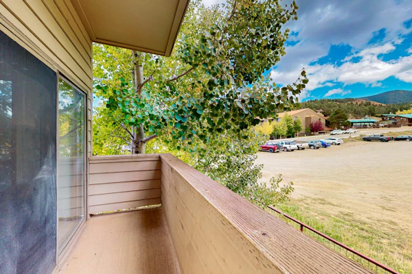 Slope-view condo with deck, stone fireplace, & walk to lifts location