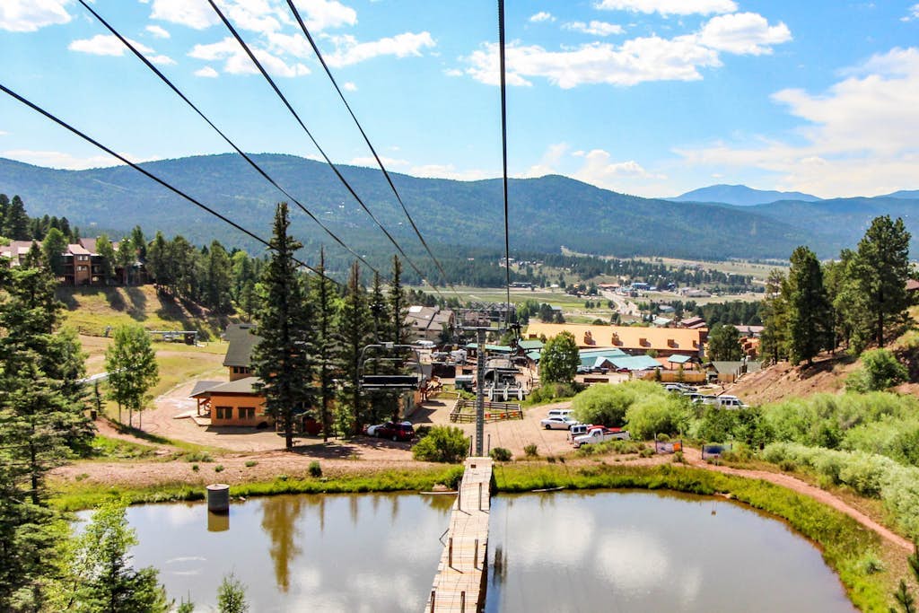 Slope-view condo with deck, stone fireplace, & walk to lifts location