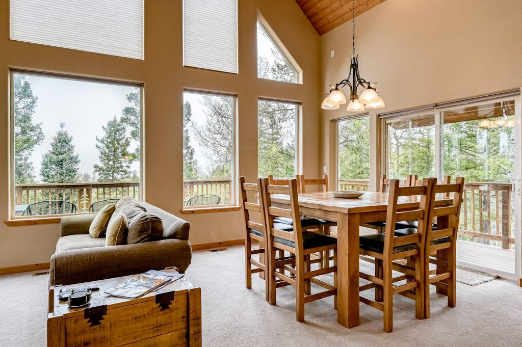 Welcome to Morada Mirasol, your home away from home in beautiful Angel Fire. Surrounded by mountain views, this spacious ski-in/ski-out (seasonal) retreat is designed for families and groups looking to relax, reconnect, and enjoy the outdoors, with a game room, a cozy fireplace, and a wraparound deck for taking in the scenery.