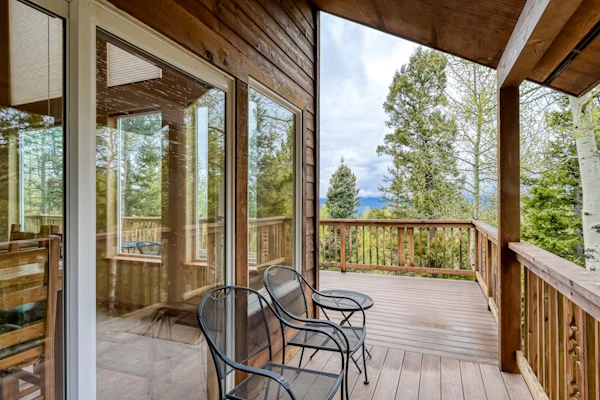 Welcome to Morada Mirasol, your home away from home in beautiful Angel Fire. Surrounded by mountain views, this spacious ski-in/ski-out (seasonal) retreat is designed for families and groups looking to relax, reconnect, and enjoy the outdoors, with a game room, a cozy fireplace, and a wraparound deck for taking in the scenery.