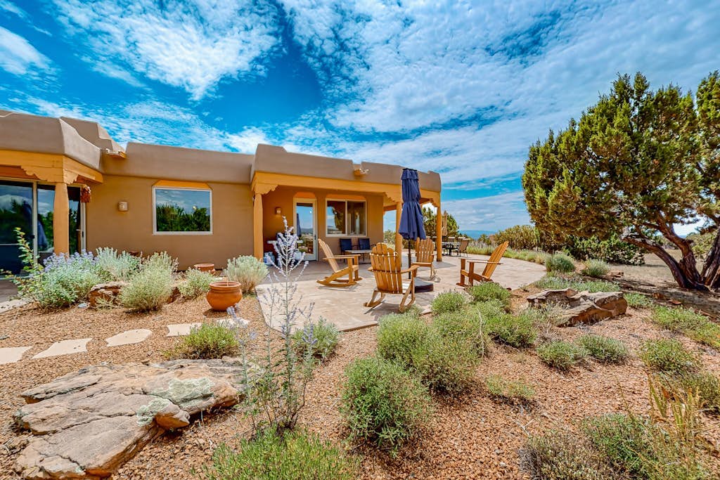 Idyllic mountain-view retreat with luxe interior & private sunset-view hot tub