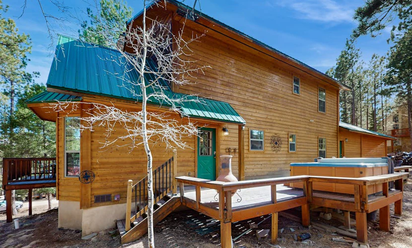 Tranquil cabin getaway with private hot tub, fire pit, deck, fireplace, & W/D