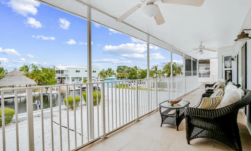 Waterfront home with amazing views, boat dock, screened porch & water sport gear