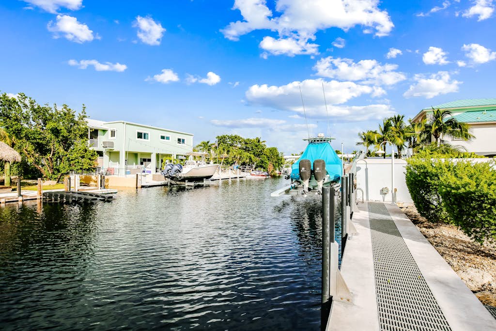 Waterfront home with amazing views, boat dock, screened porch & water sport gear