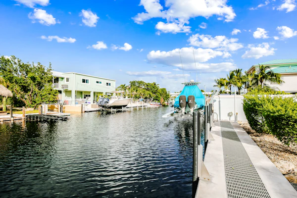 Waterfront home with amazing views, boat dock, screened porch & water sport gear