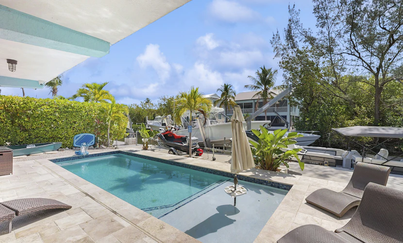 Waterfront getaway w/ stunning view, dockage, private pool, ping-pong, gas grill