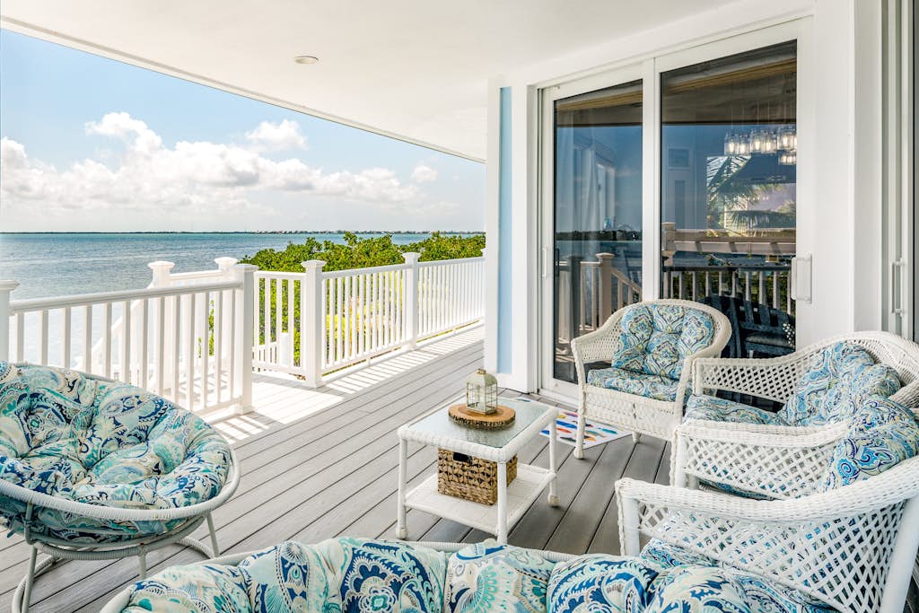 Amazing waterfront home with private beach, dock, pool, WiFi & outdoor kitchen