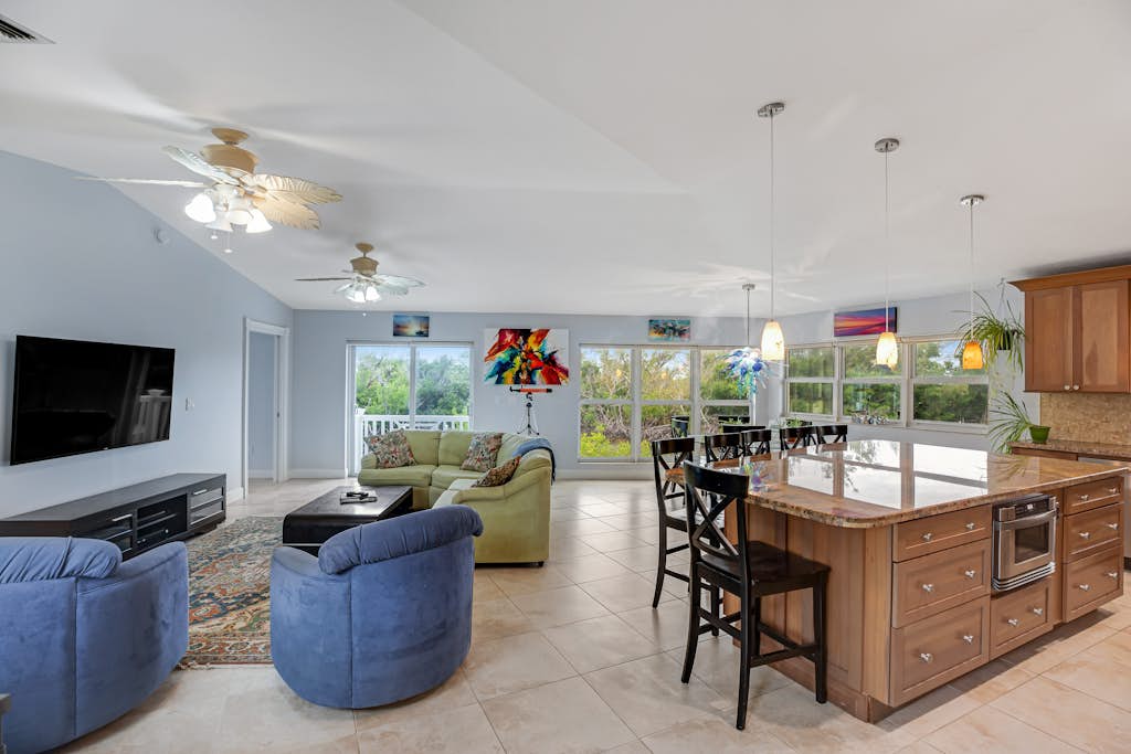 Waterfront hideaway with dock, pool & inviting patio - walk to Sombrero Beach