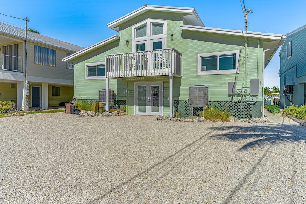 Enchanting dog-friendly waterfront retreat with pool, hot tub, & amazing views