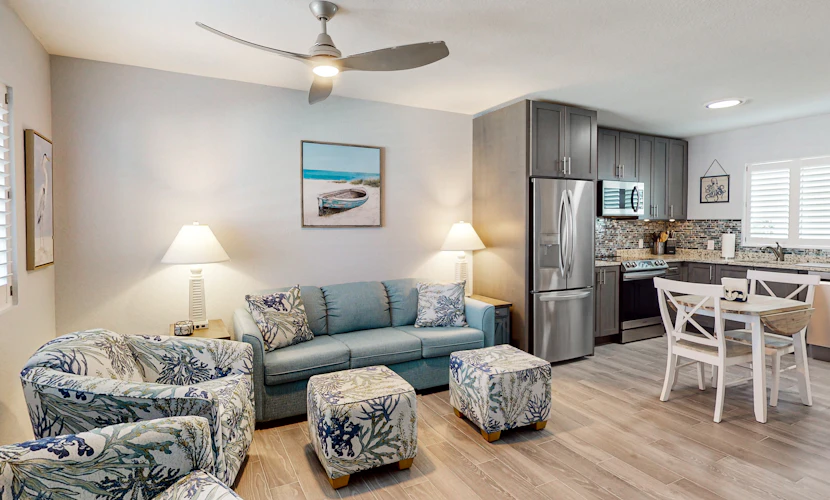 Island retreat with a pool, grill, & beach access - W/D, central AC, & balcony