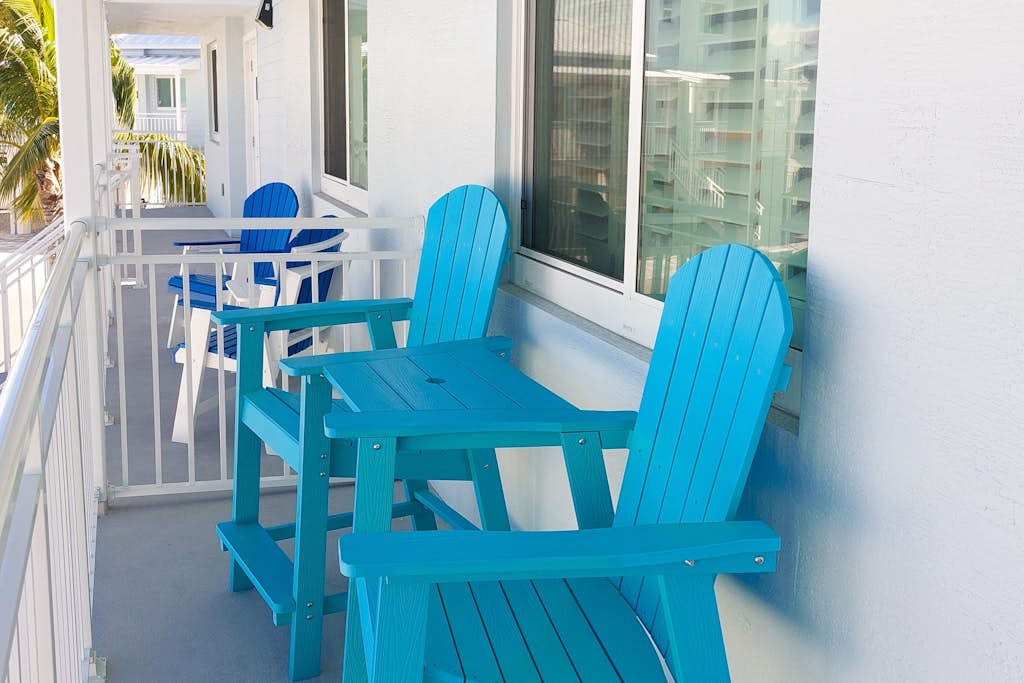 Island retreat with a pool, grill, & beach access - W/D, central AC, & balcony