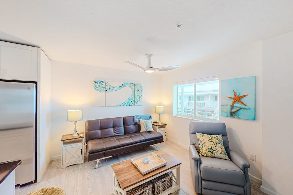Snowbird-friendly sound view condo with open layout, patio, W/D, & AC