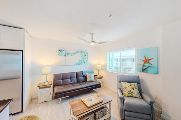 Snowbird-friendly sound view condo with open layout, patio, W/D, & AC