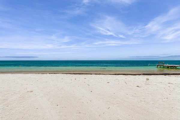 Historically located condo w/ocean views, pool, loft, AC & guest boat access