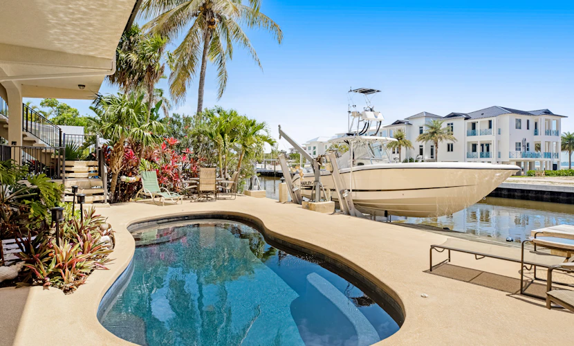 Waterfront home with ocean views, dock, & private outdoor pool
