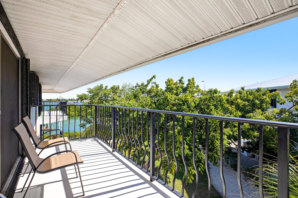 Second Floor Condo with Shared Pool, Shared Dock, Central AC, WiFi, and W/D