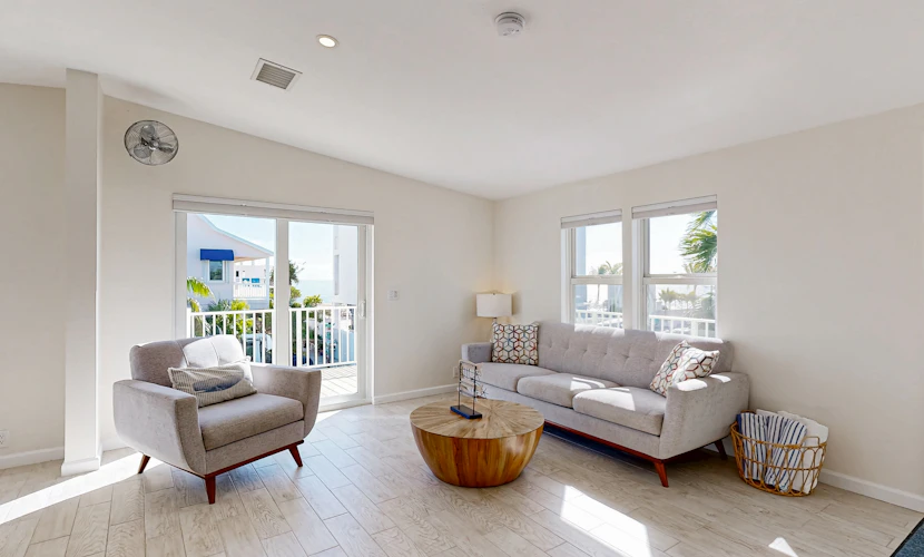 Modern waterfront home with balcony, patio, grill, W/D, & easy Atlantic access