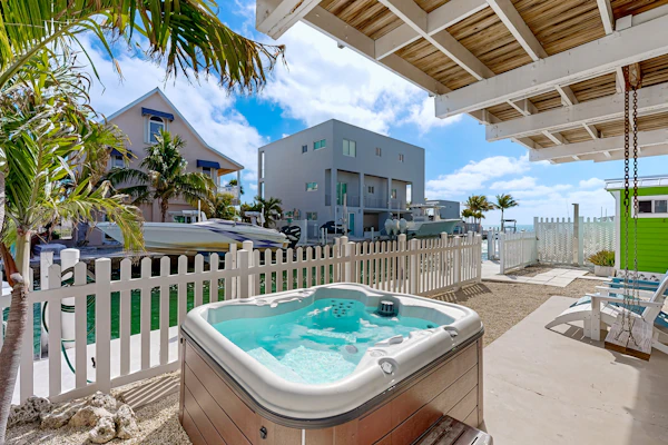Modern waterfront home with balcony, patio, grill, W/D, & easy Atlantic access