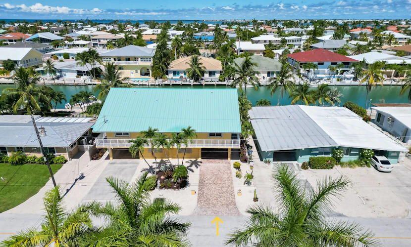 Waterfront home with 35-ft dock & access to Cabana Club pool & beach