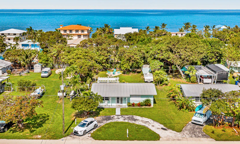 Inviting home near the water with gazebo, fire table, heated pool & spa