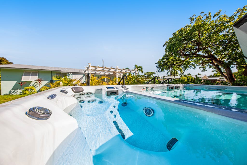 Inviting home near the water with gazebo, fire table, heated pool & spa