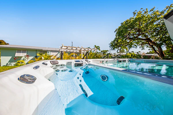 Inviting home near the water with gazebo, fire table, heated pool & spa