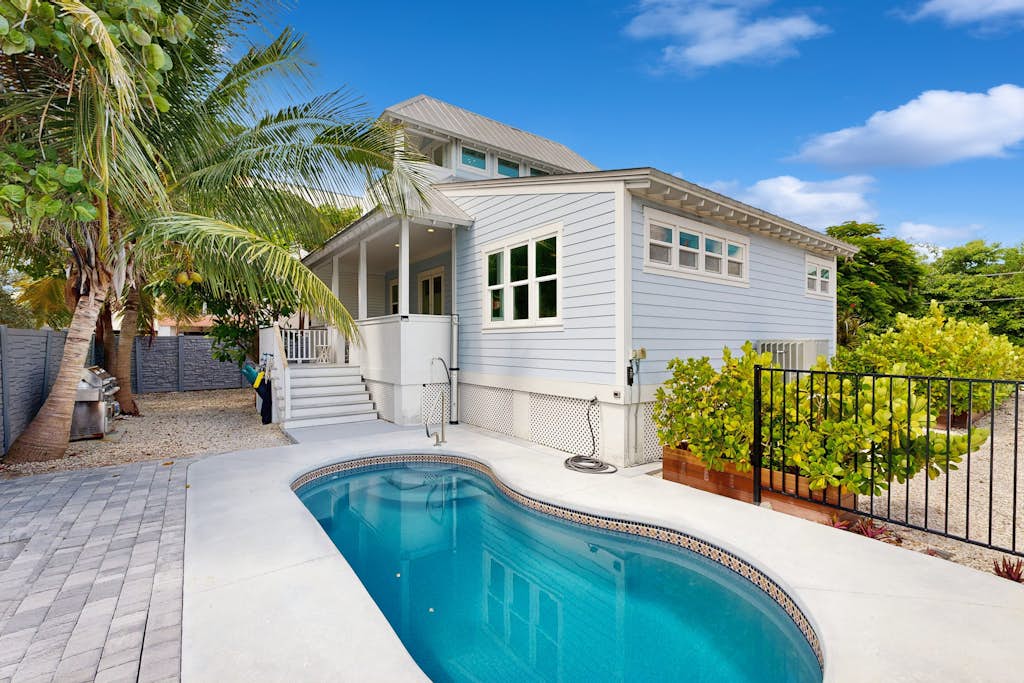 Key West style waterfront home w/ private pool, modern decor and prime location