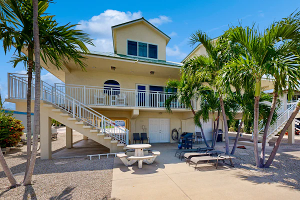 Waterfront home with 35-foot dock, Cabana Club membership with pool/beach access