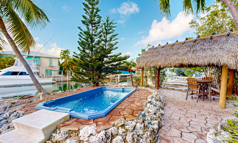 Summerland Canal-Front Escape w/ Plunge Pool, Dock, Tiki Bar, WiFi & Laundry