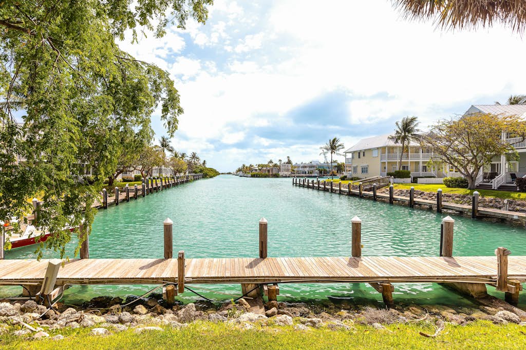 Waterfront, dog-friendly home with beautiful canal view & 2 shaded porches