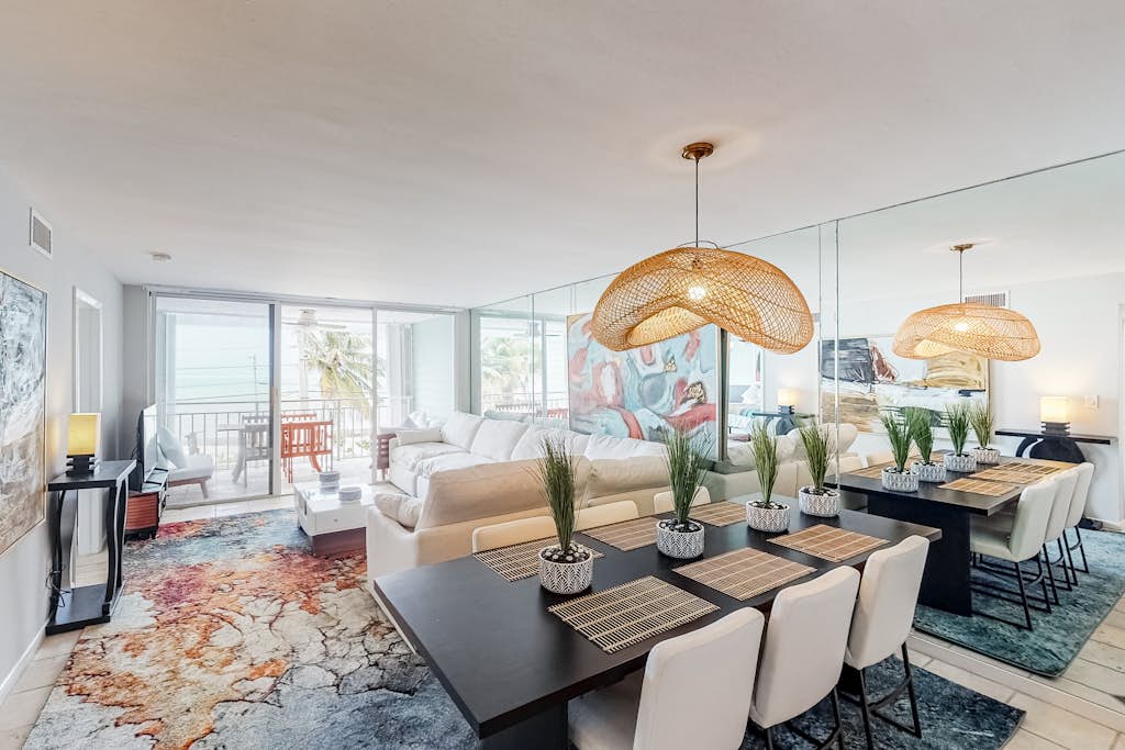 Colorful waterfront condo with pool & hot tub, AC, W/D, & WiFi