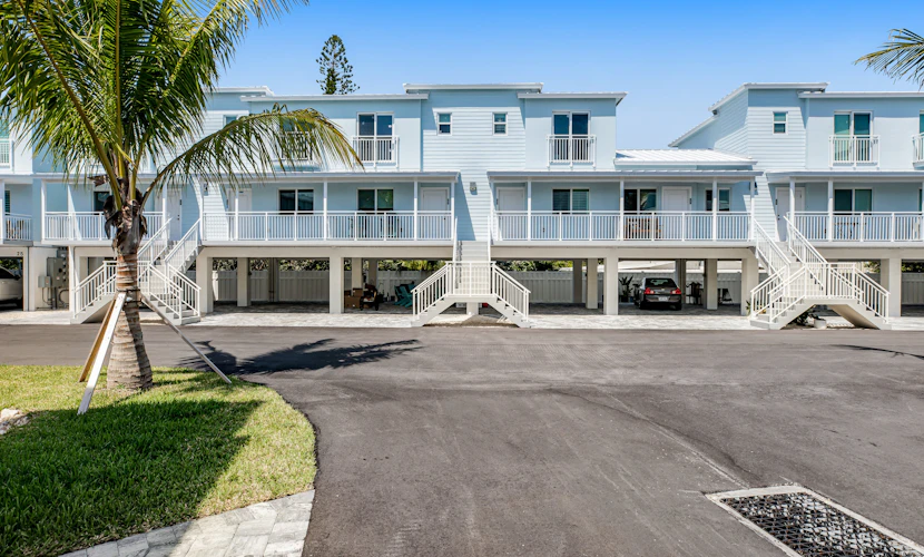 Inviting oceanfront condo with pool, dock, balcony, & W/D