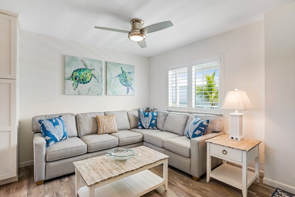 Inviting oceanfront condo with pool, dock, balcony, & W/D