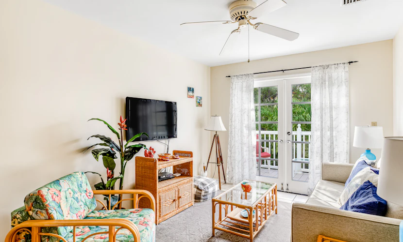 Snowbird-friendly condo with private balcony, garden views, W/D, on-site pool