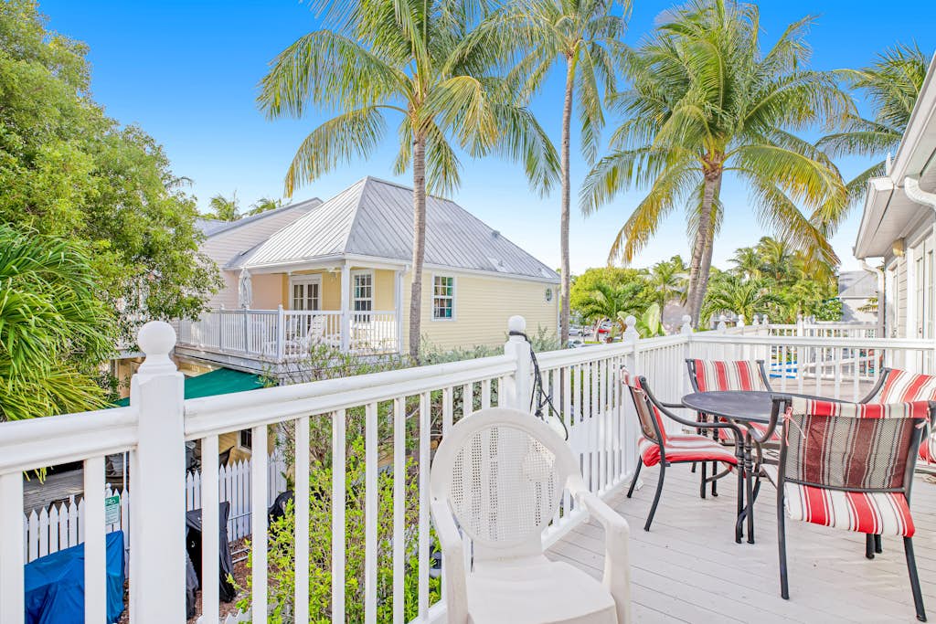Snowbird-friendly condo with private balcony, garden views, W/D, on-site pool