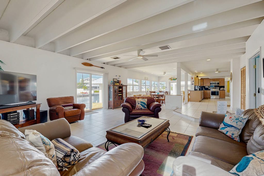 Canal Front Gem W/ Private Dock, PS4, Free WiFi, & Expansive Balcony W/ Views