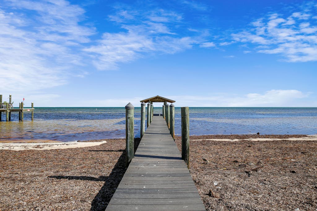 Family-friendly oceanfront home with private beach, private gas grill, and deck