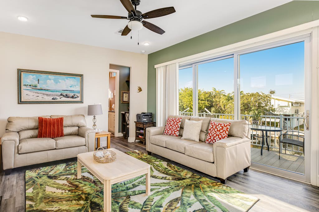 Beautiful waterfront home with central AC, dock, lovely balcony & patio