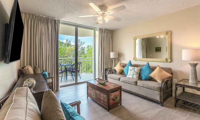 Dog-friendly condo with pool, hot tub, balcony, central AC, W/D, & fitness room