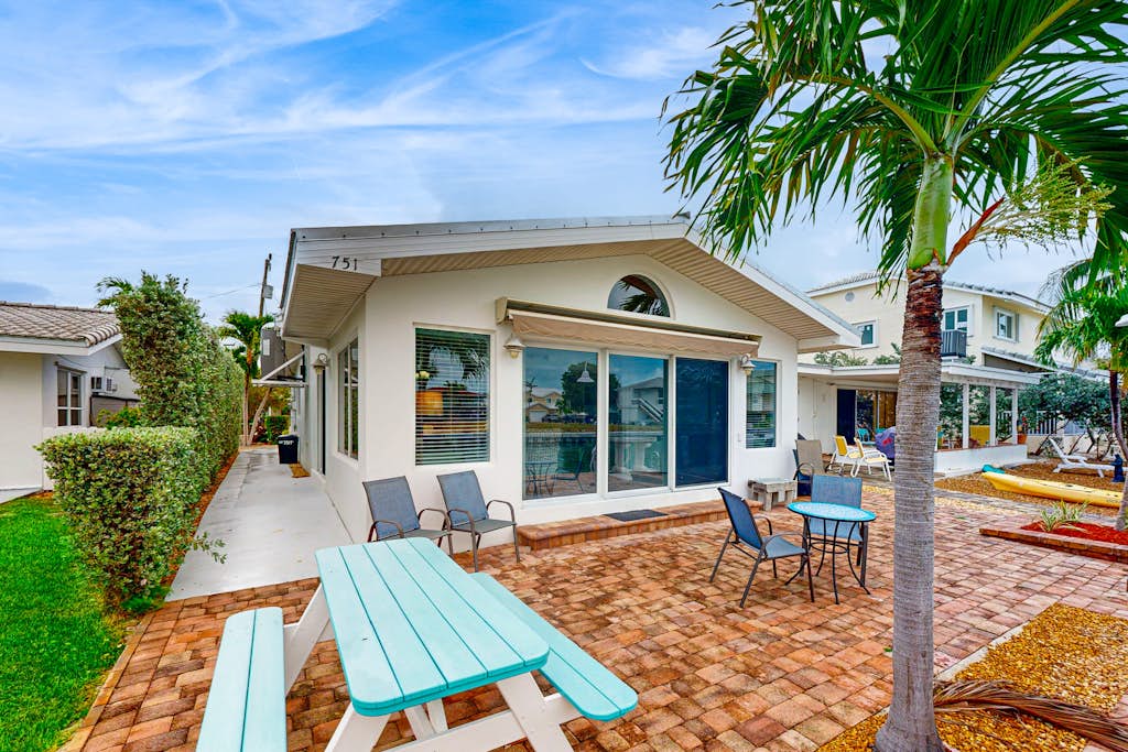 Waterfront Home with 35-Foot Dock and Access to Private Beach and Shared Pool