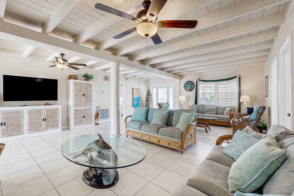 Waterfront home with Cabana Club access, private pool, spa, & dock