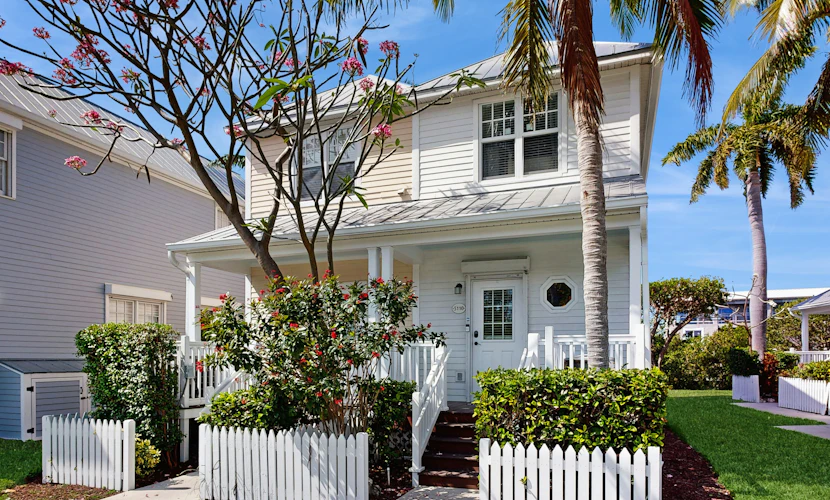 Charming townhome with ocean views, an open porch & steps from the water